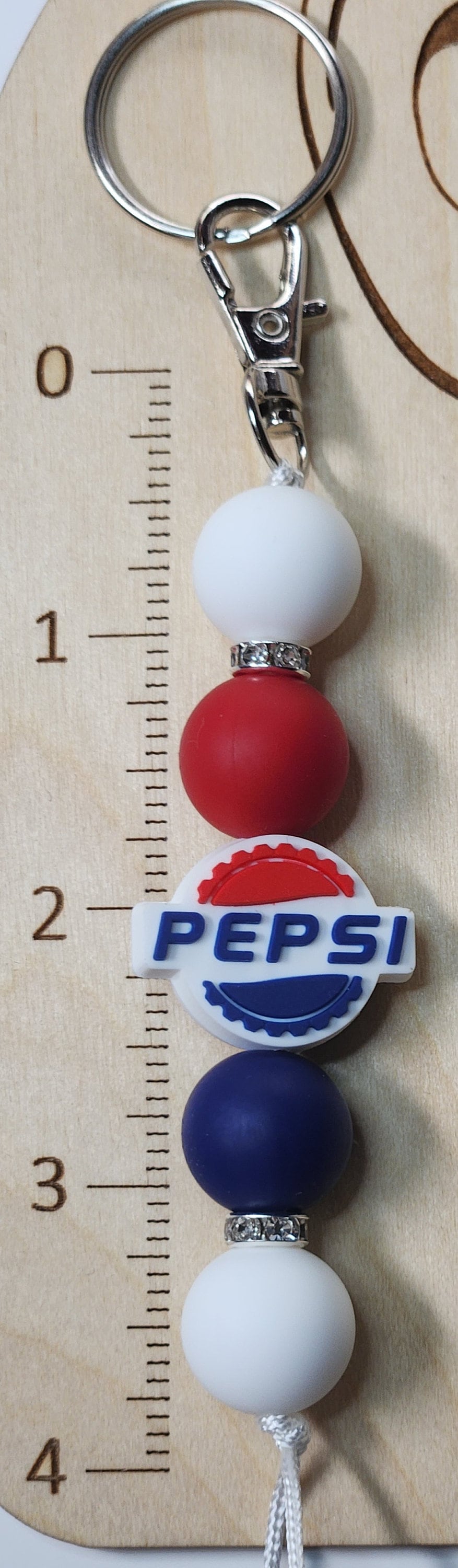 Blue and Red Cola silicone beaded keychain