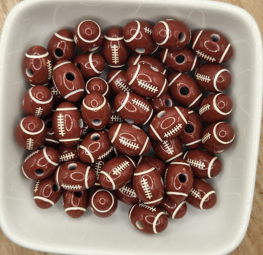 12 mm by 18 mm Acrylic Football beads. (*Individually sold* price for one bead)